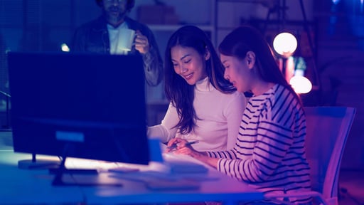 Two women working at desk